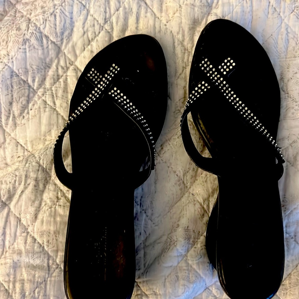 Black Sandles size 9, 3 inch heel down to 1 inch. Preowned , good condition.